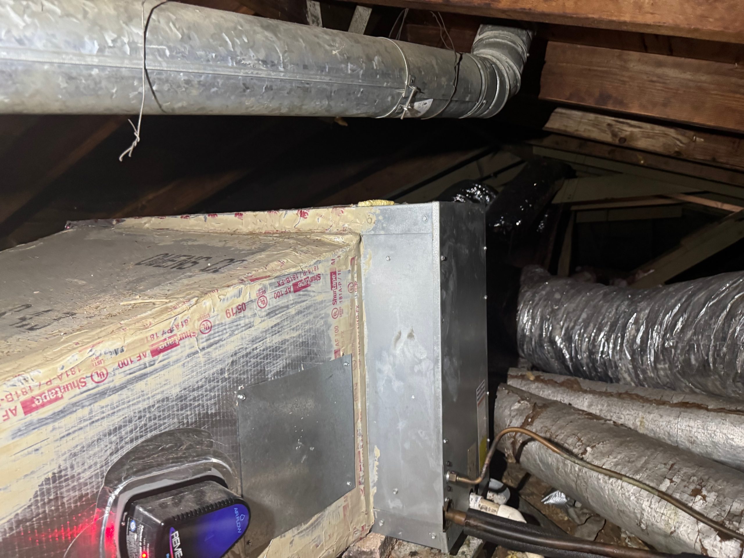 Heating services in Mobile, AL – Magnolia Air Solutions installing a residential furnace and HVAC system in an attic.

