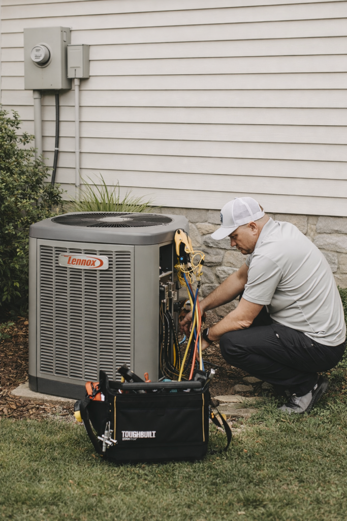 Outdoor AC unit running during summer in Mobile AL